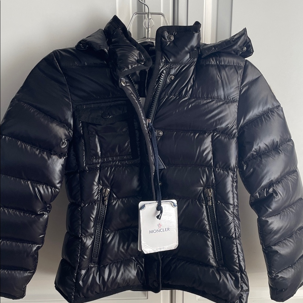 Moncler puffer jacket. Goose down with fur trim on hood. Size 8 anni 130 cm.